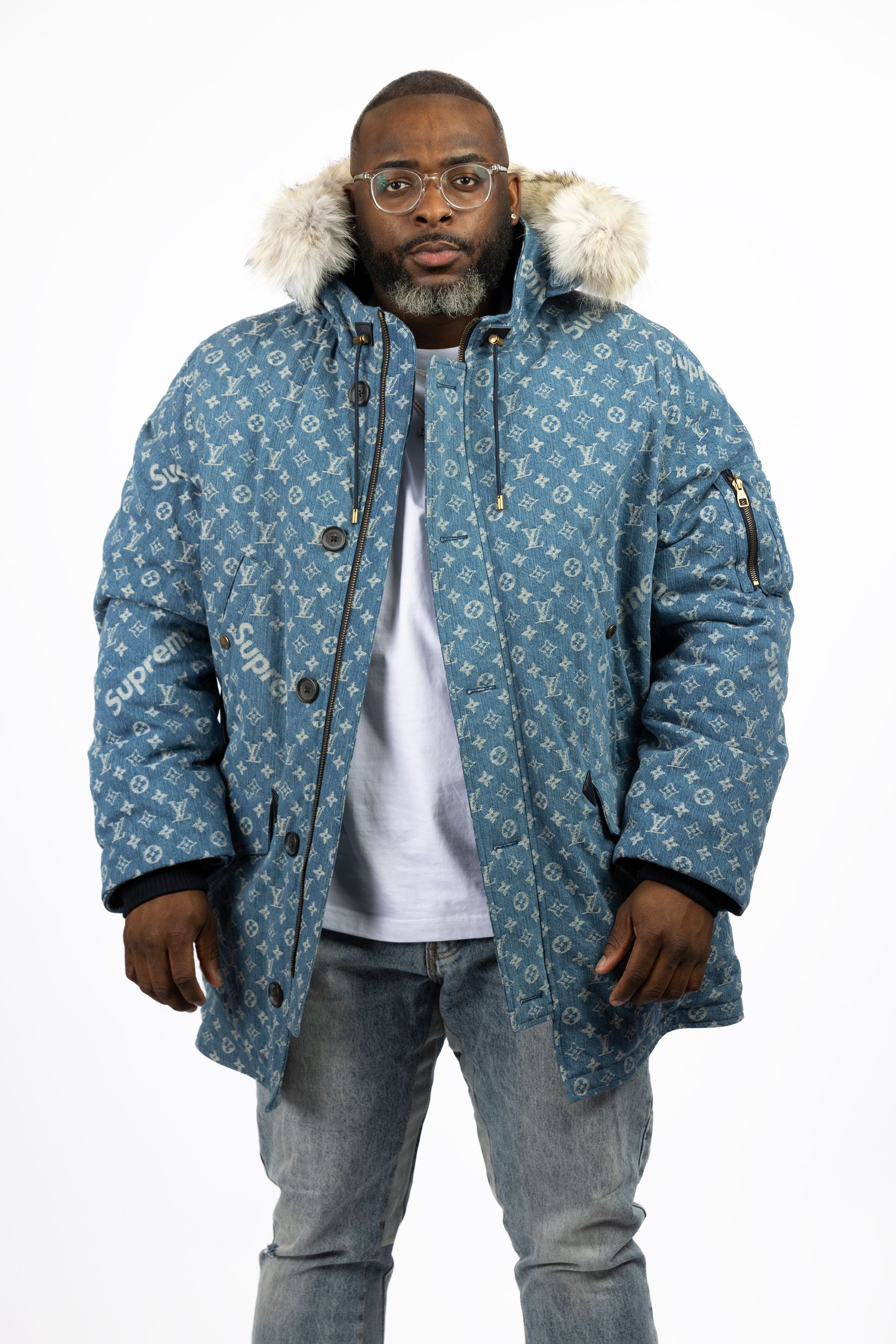 Model rocking the Supreme Louis Vuitton Jacquard Denim N-3B Parka unbuttoned front view